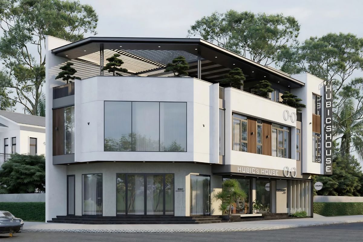 35+ mẫu biệt thự hiện đại 2 mặt tiền đẹp, bản vẽ & kinh nghiệm thiết kế 2026 6 Hệ kính lớn giúp mẫu biệt thự 2 mặt tiền tăng khả năng nhận diện thương hiệu (Ảnh: Sưu tầm)