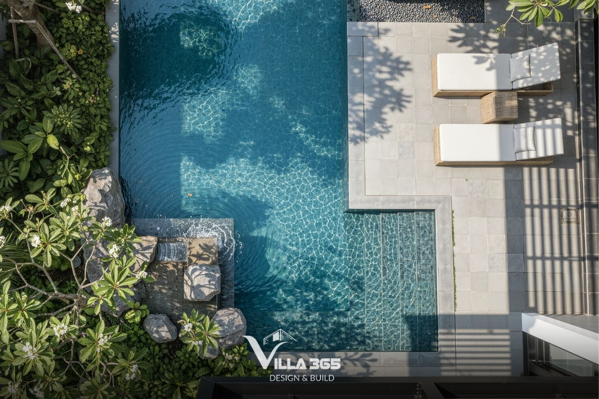 Bonded Villa - Biệt thự 3 tầng có vườn trên mái, tận dụng yếu tố tự nhiên để giảm năng lượng vận hành 7 Hồ bơi kết hợp thác nước đá tự nhiên tạo nên lớp đệm vi khí hậu, cân bằng độ ẩm hiệu quả