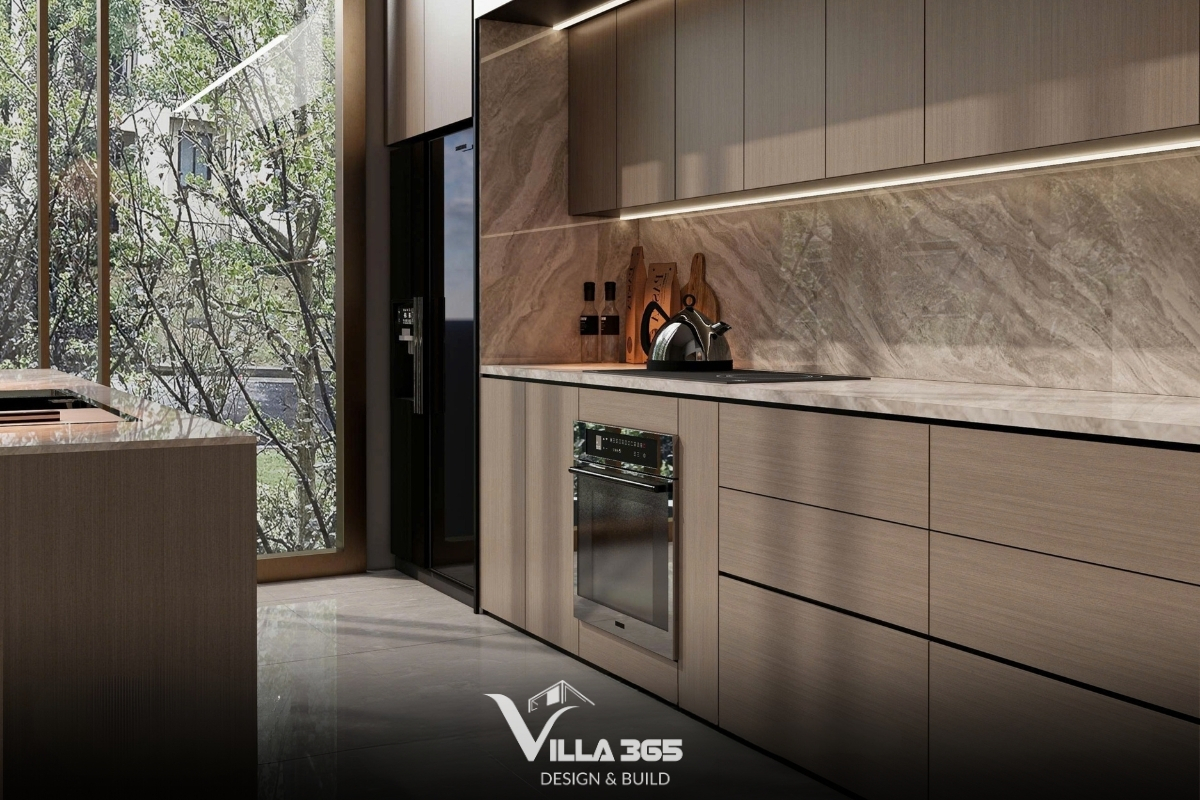 D’s Villa - Thiết kế nội thất với cảm hứng từ nếp nhà xưa 10 Phần tường bếp được ốp đá tự nhiên với vân mây mềm mại, kết hợp cùng dải đèn LED âm tủ giúp không gian sáng sủa và ấm cúng
