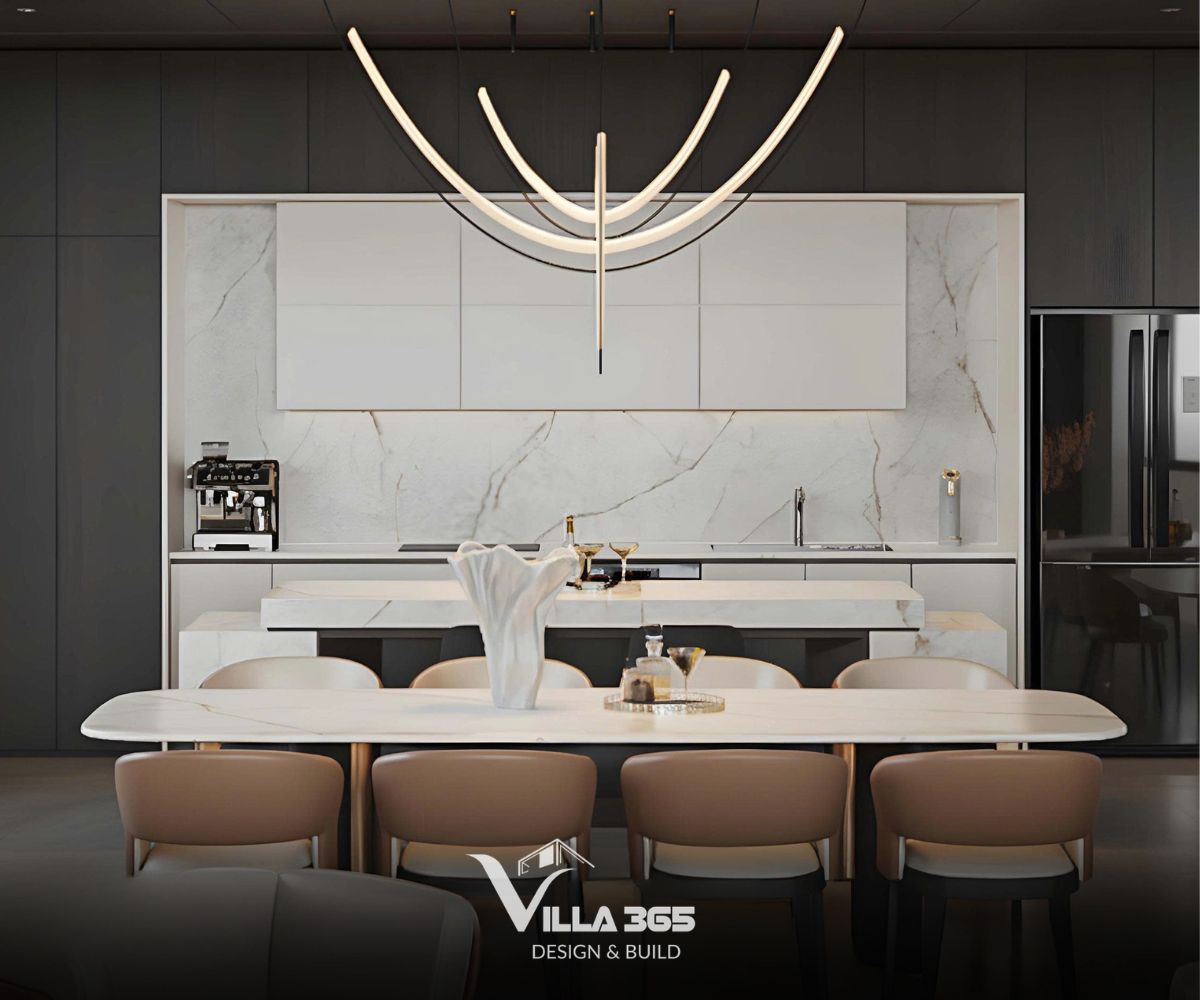 Thiết kế nội thất An’s Villa – Nếp nhà an yên cho tuổi già nhẹ nhõm 6 Mặt bếp và phần ốp tường sử dụng đá cẩm thạch trắng vân mây đồng nhất với đảo bếp, tạo sự kết nối liền mạch