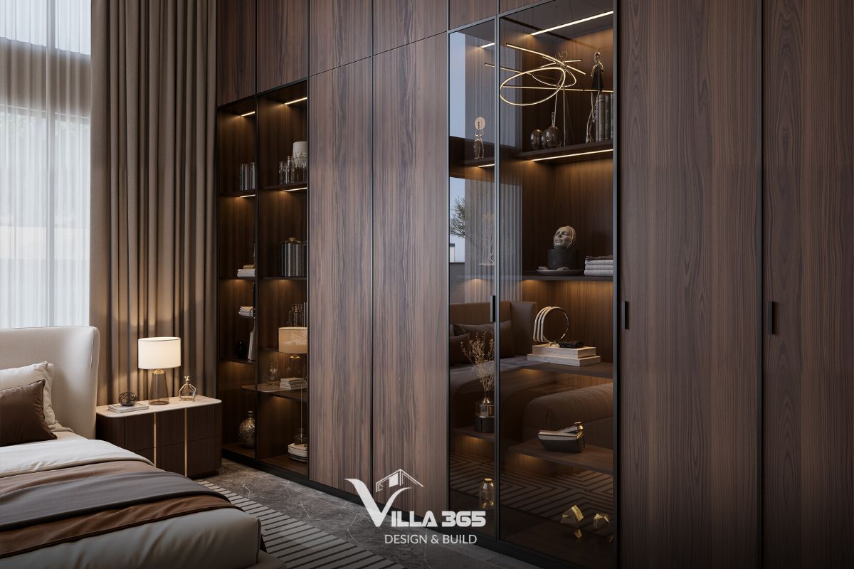 Thiết kế nội thất Breeze Villa – Tối ưu trải nghiệm sống cho gia chủ làm việc tại nhà 10 Khối tủ lớn được thiết kế âm tường toàn bộ, tạo một diện phẳng đồng nhất từ sàn lên đến đỉnh trần cao, giúp tối ưu diện tích