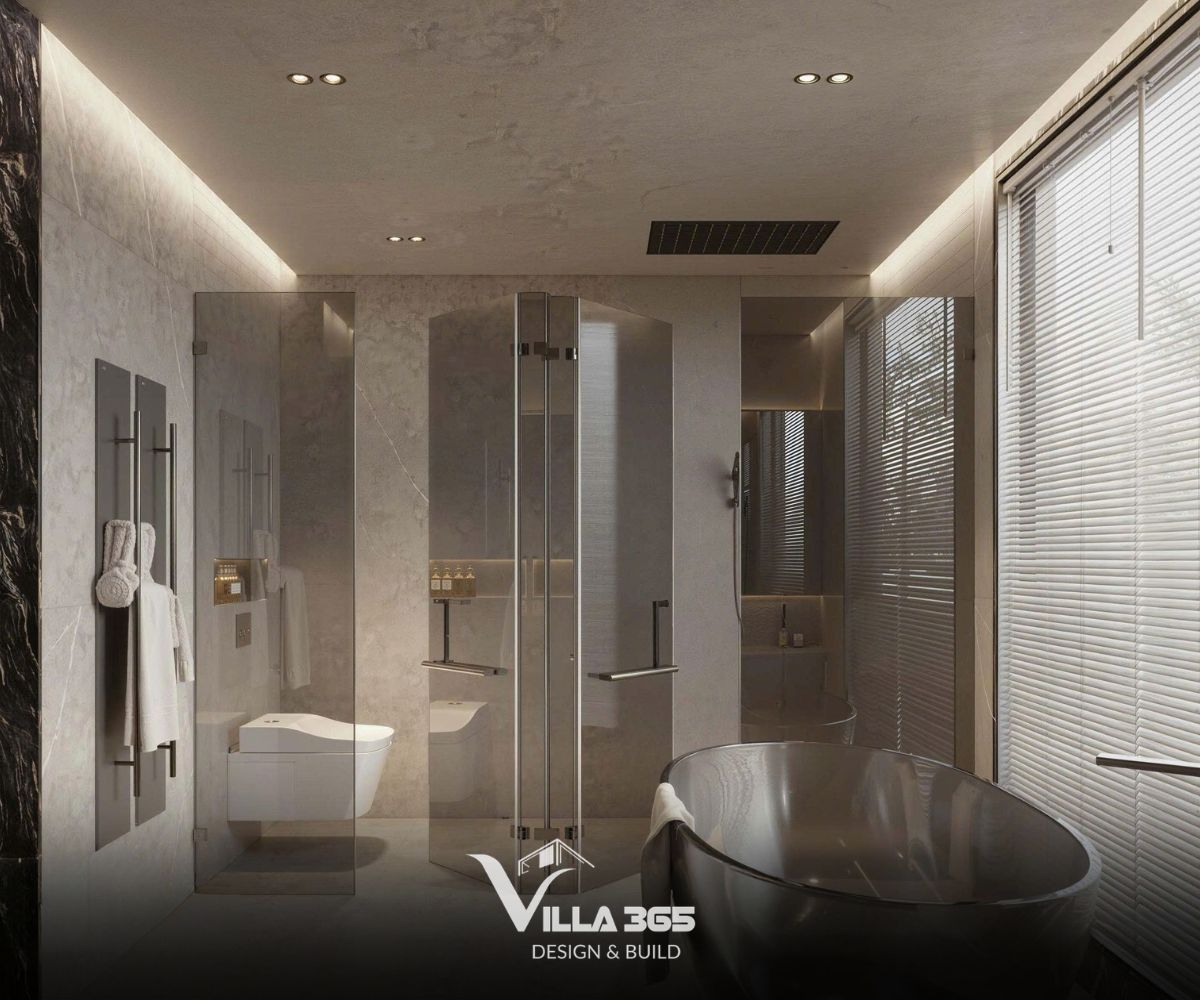Thay vì sử dụng những bức tường dày đặc, các vách kính cường lực được dùng để phân định rõ ràng khu vực tắm đứng và bồn tắm 