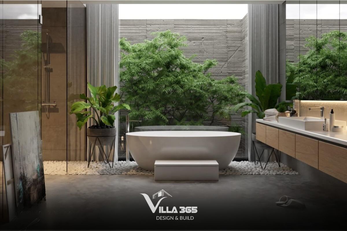 Bồn tắm được đặt ngay trước hệ kính lớn sát đất, hướng thẳng ra khoảng sân vườn nhỏ với những tán cây xanh mướt 