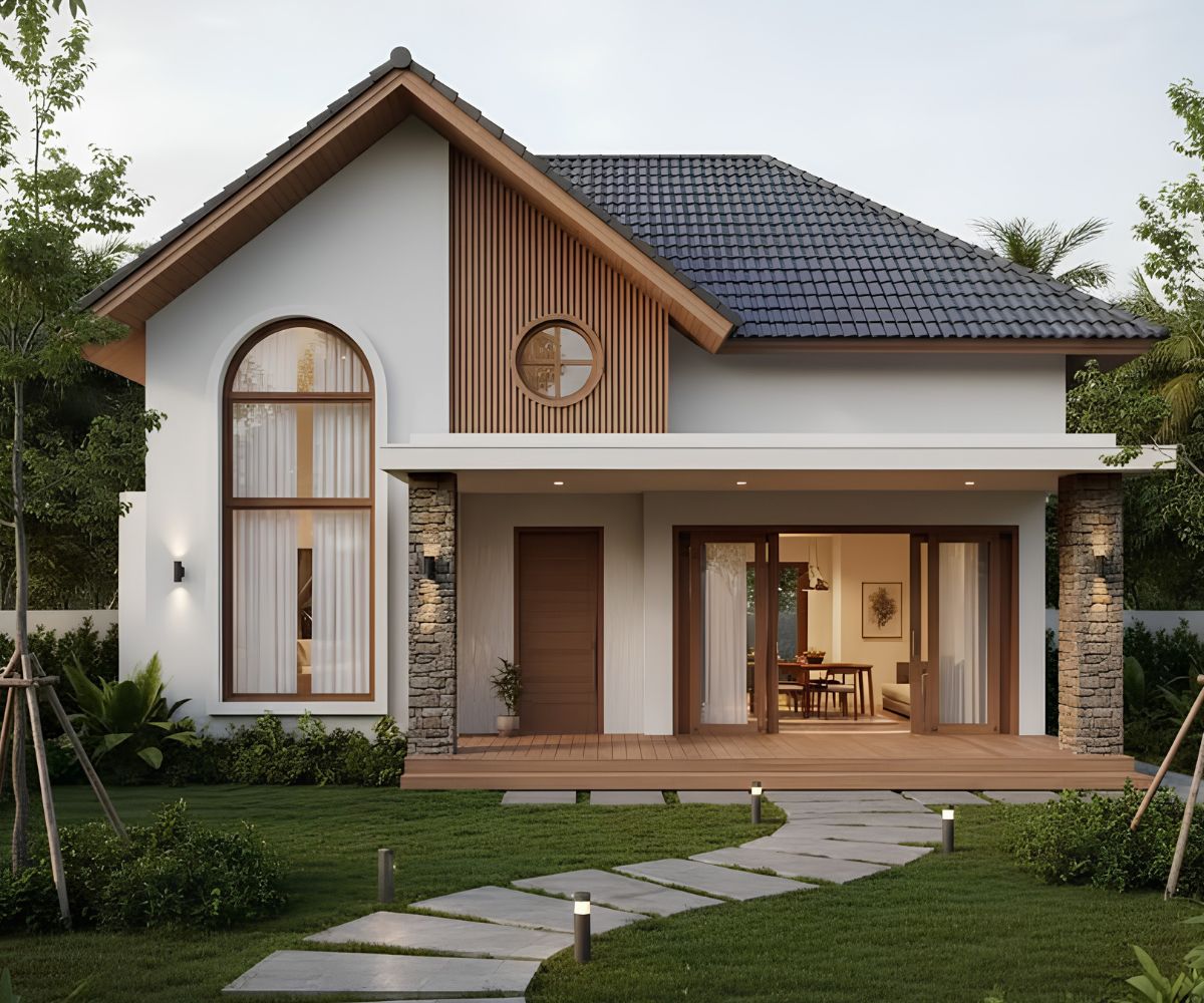 Mặt tiền mở cùng hệ cửa kính lớn giúp biệt thự 1 trệt 1 lầu mái thái đón sáng tự nhiên hiệu quả và tăng sự kết nối với cảnh quan bên ngoài (Ảnh: Sưu tầm)
