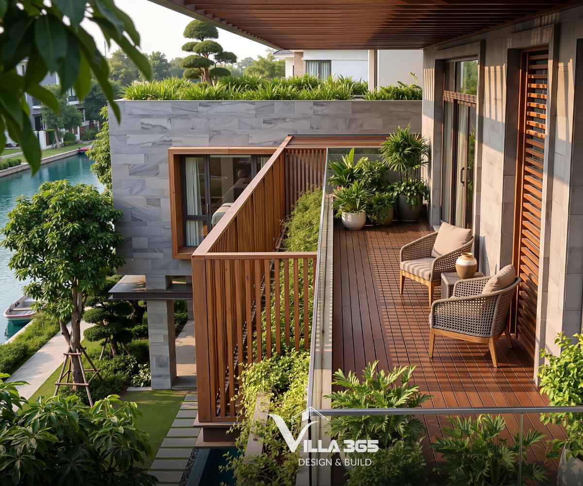 Ban công bố trí ghế mây và bàn trà để gia chủ ngắm cảnh và thư giãn