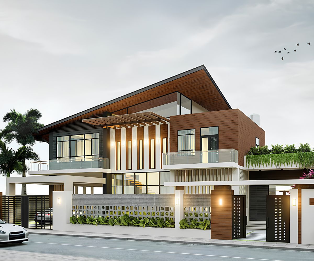 50+ Mẫu Biệt Thự 2 Tầng Mái Lệch Đẹp, Hiện Đại & Báo Giá Thi Công 2026 21 Biệt thự 2 tầng mái lệch có gara đáp ứng nhu cầu đỗ xe an toàn và thuận tiện cho gia đình hiện đại (Ảnh: Sưu tầm)