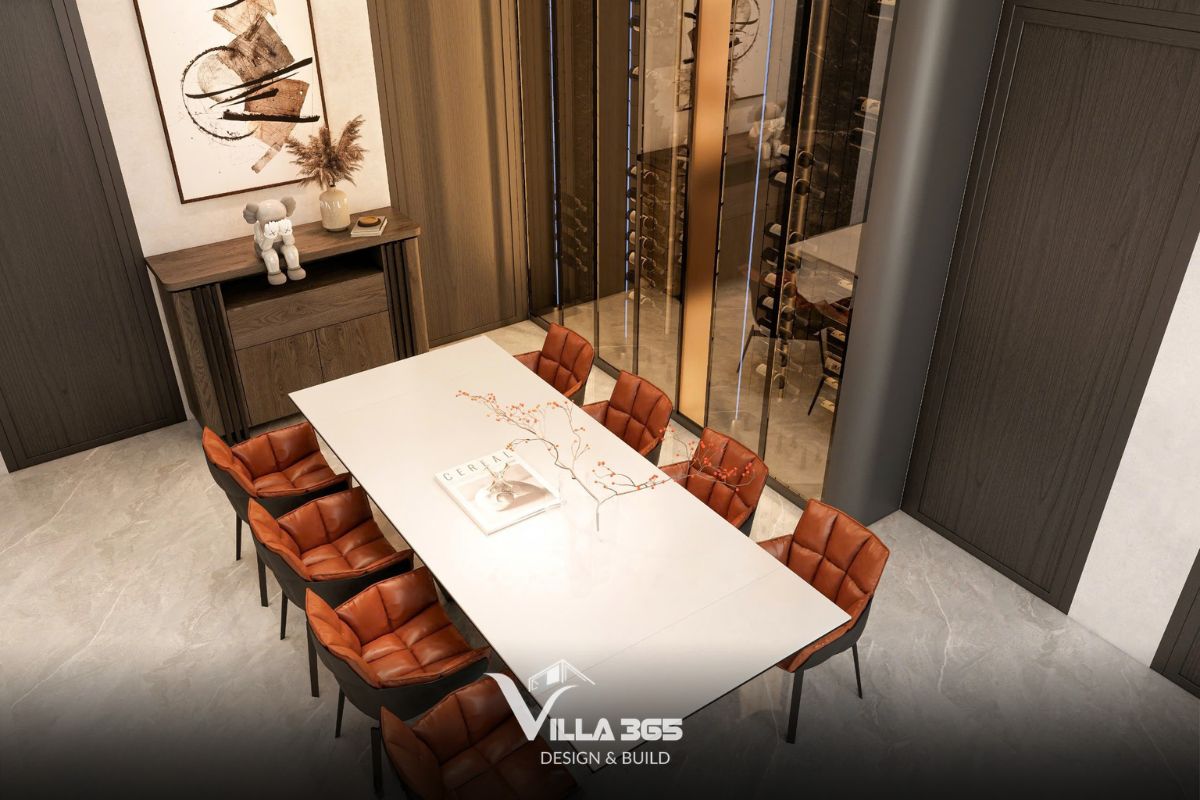 Thiết kế nội thất Dual Villa – Giải pháp tổ chức không gian kép cho gia chủ làm việc tại nhà 5 Sắc cam đất nồng ấm của ghế da cao cấp mang lại cảm giác ấm cúng, sang trọng và tràn đầy năng lượng cho khu vực ăn uống