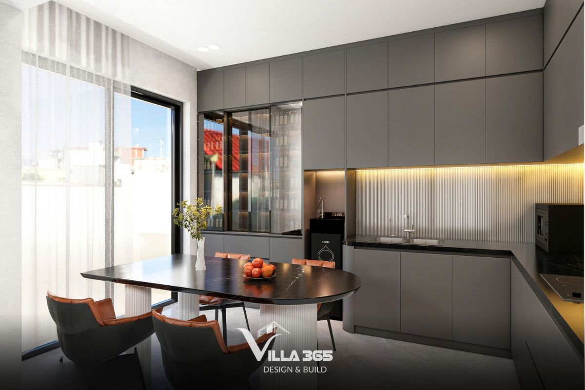 Thiết kế nội thất Dual Villa – Giải pháp tổ chức không gian kép cho gia chủ làm việc tại nhà 6 Máy lọc nước, lò vi sóng và tủ trưng bày cánh kính được thiết kế âm tủ một cách vừa vặn, tối ưu hóa diện tích cho phòng bếp phụ
